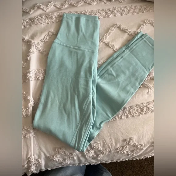 basically brand new leggings worn twice 
light blue lulu leggings 
size 6 - Picture 2 of 2